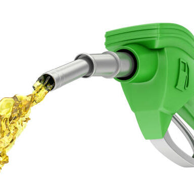Green gas pump with petrol splash on white background, 3d render